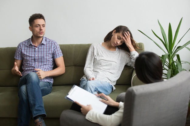 Couple receiving psychological help from expert couple-receiving-psychological-help-from-expert