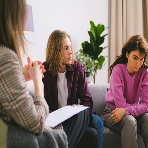 A group therapy session in a cozy setting A-group-therapy-session-in-a-cozy-setting